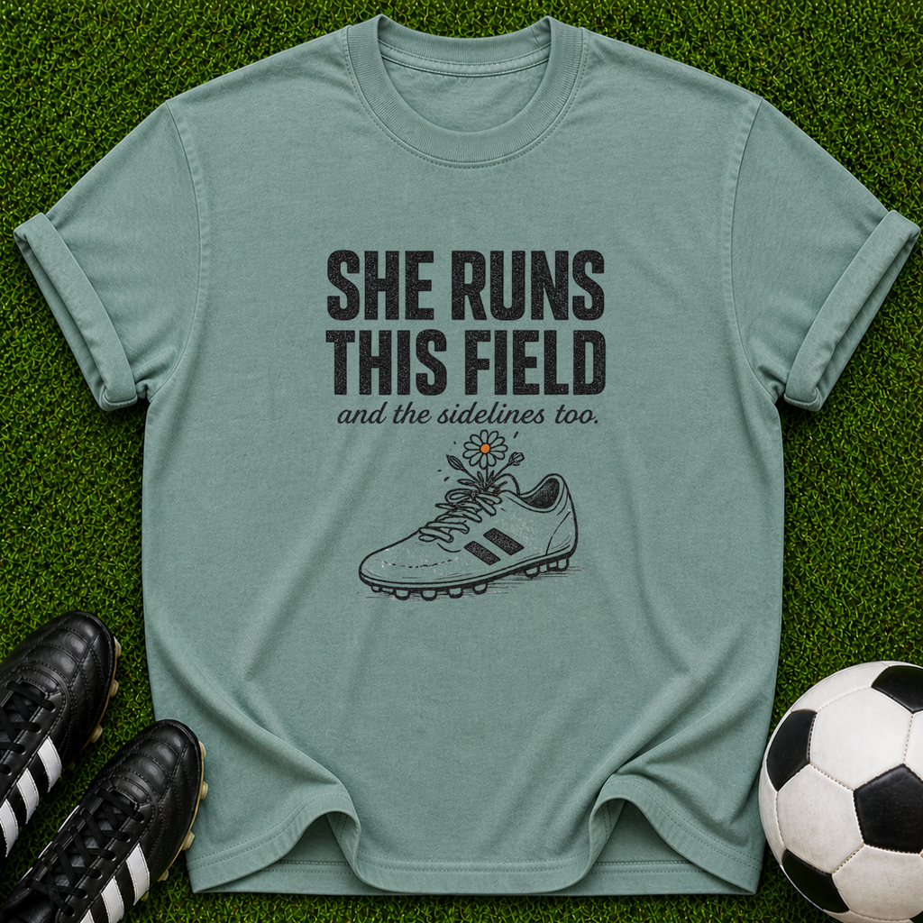 She Runs This Field soccer cleat T-shirt