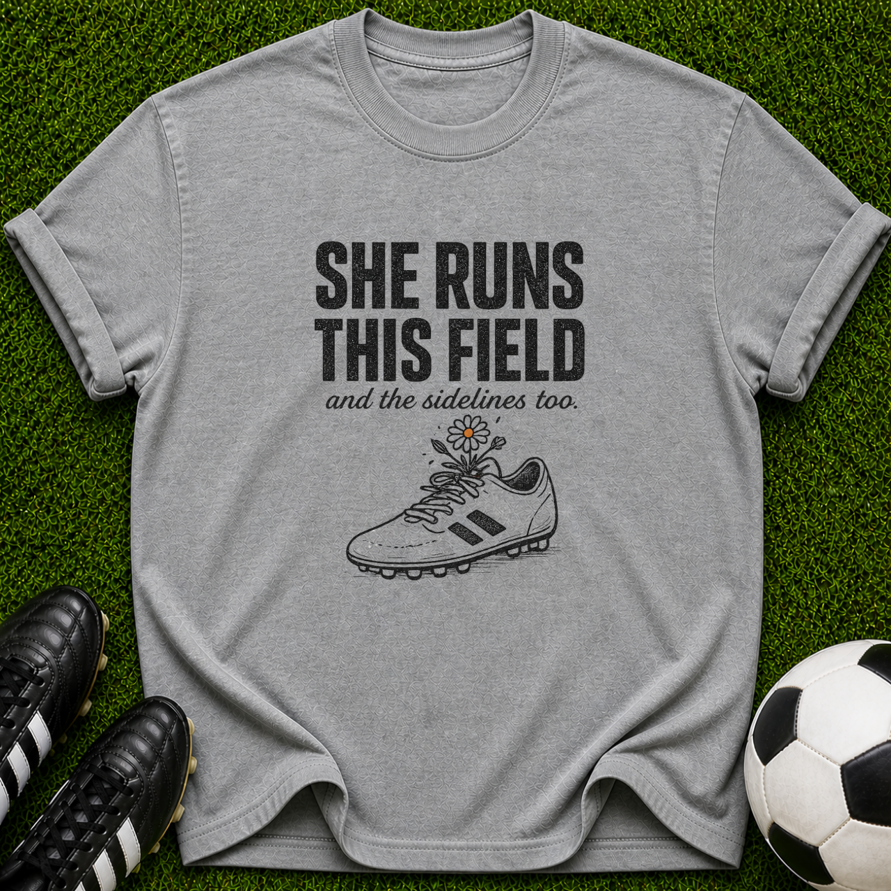 She Runs This Field soccer cleat T-shirt